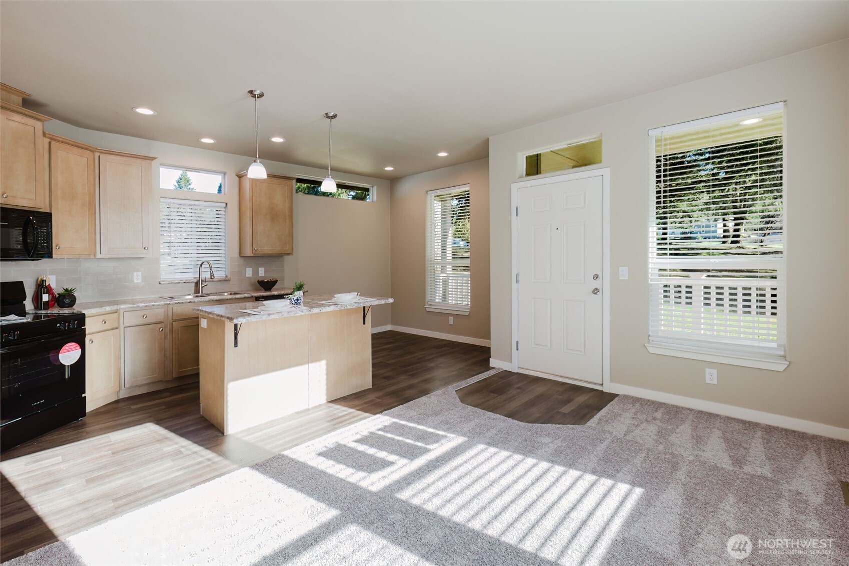 3371 Southeast Bielmeier Road, Unit 95 Port Orchard, WA 98367 - Photo 15 of 40 a kitchen with a refrigerator and a sink
