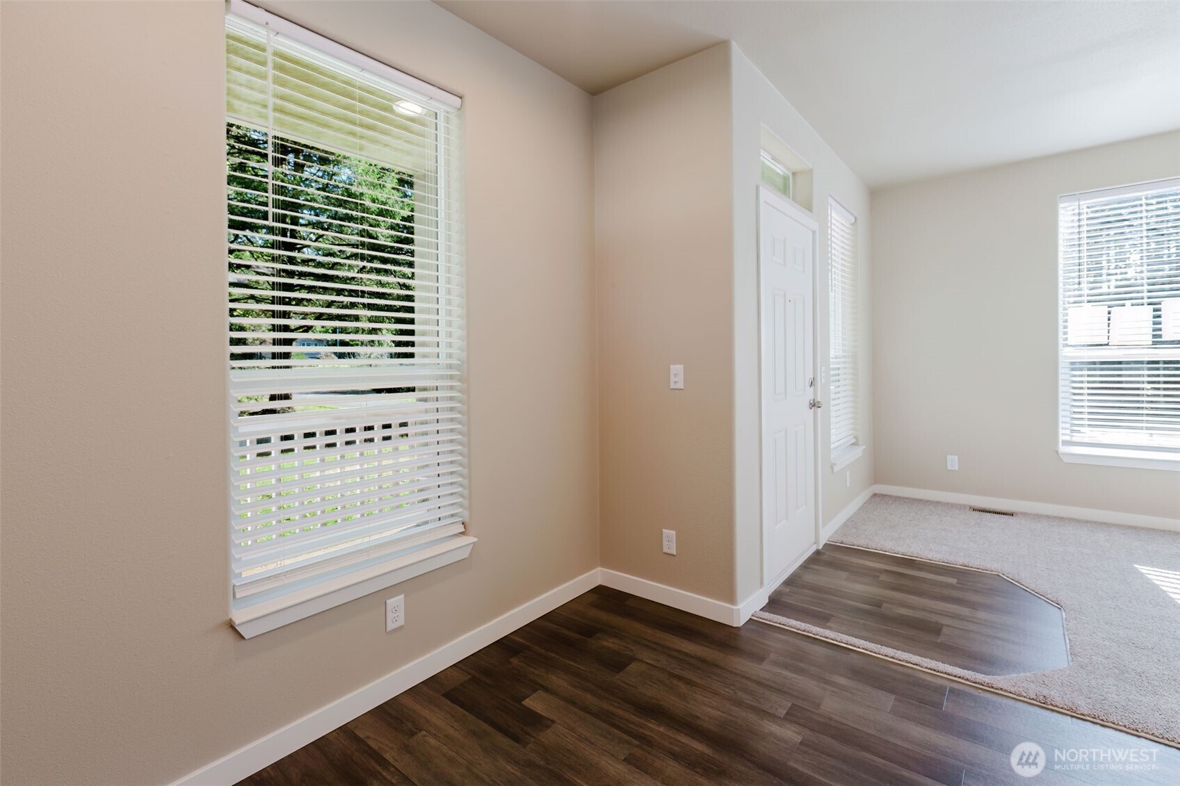 3371 Southeast Bielmeier Road, Unit 95 Port Orchard, WA 98367 - Photo 18 of 40 an empty room with windows