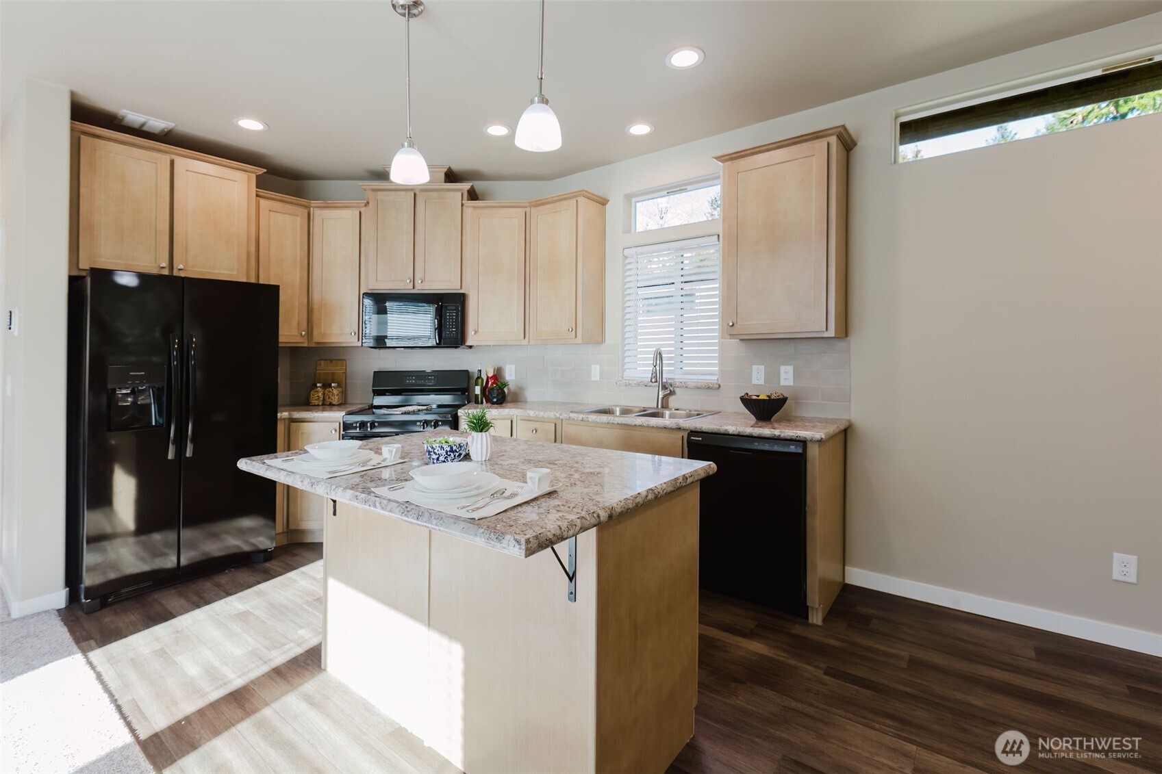 3371 Southeast Bielmeier Road, Unit 95 Port Orchard, WA 98367 - Photo 20 of 40 a kitchen with stainless steel appliances granite countertop a sink stove and refrigerator