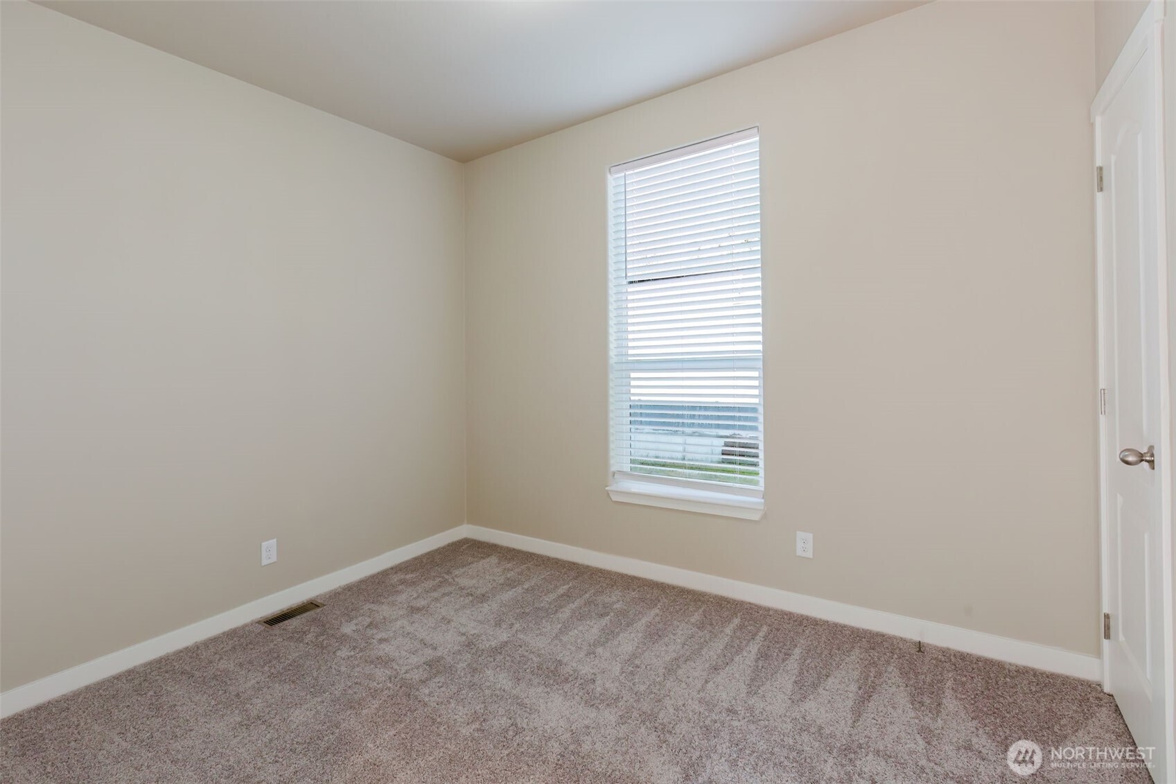 3371 Southeast Bielmeier Road, Unit 95 Port Orchard, WA 98367 - Photo 25 of 40 an empty room with a window