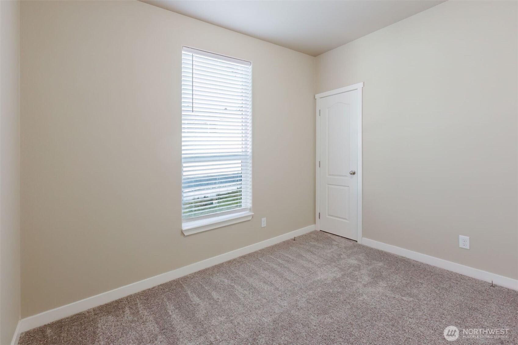 3371 Southeast Bielmeier Road, Unit 95 Port Orchard, WA 98367 - Photo 27 of 40 an empty room with a window