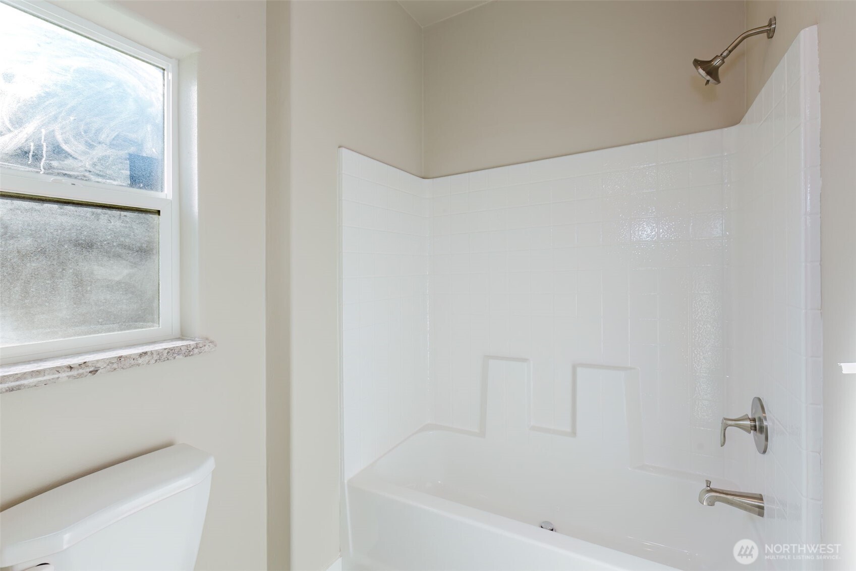3371 Southeast Bielmeier Road, Unit 95 Port Orchard, WA 98367 - Photo 30 of 40 a bathroom with a bathtub