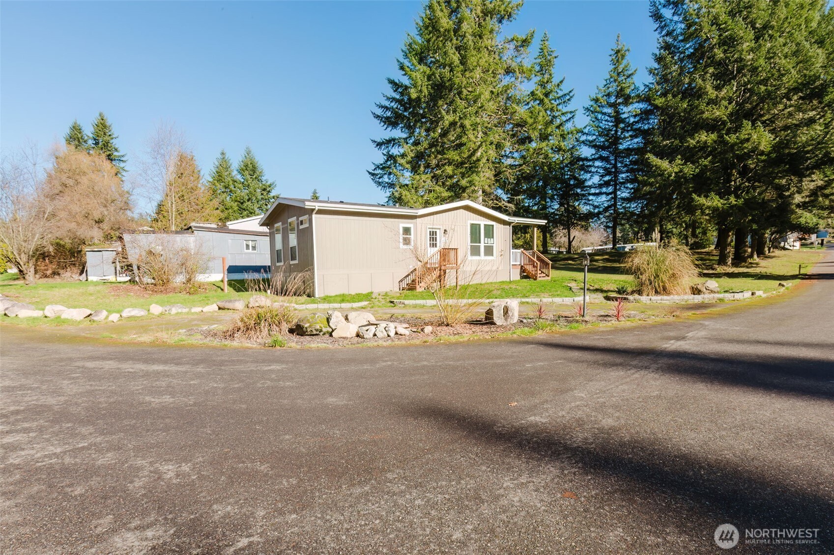 3371 Southeast Bielmeier Road, Unit 95 Port Orchard, WA 98367 - Photo 3 of 40 a view of a street with houses