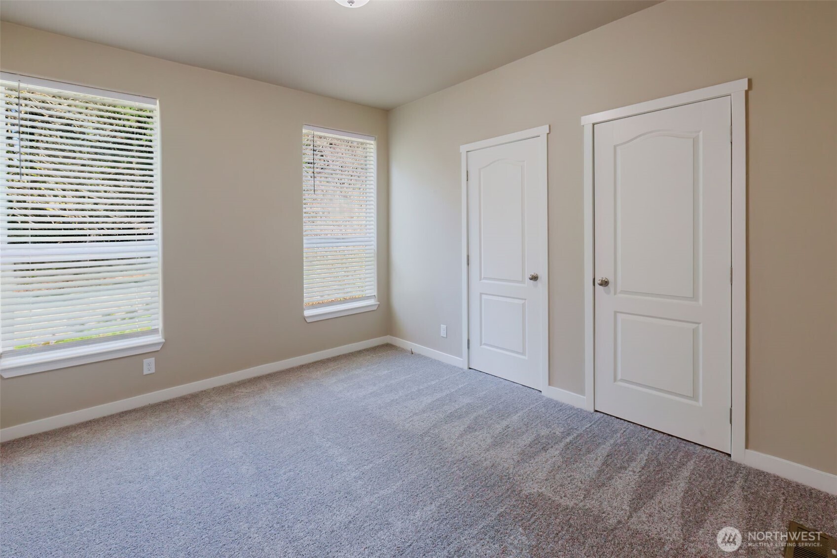 3371 Southeast Bielmeier Road, Unit 95 Port Orchard, WA 98367 - Photo 31 of 40 a view of an empty room with a window