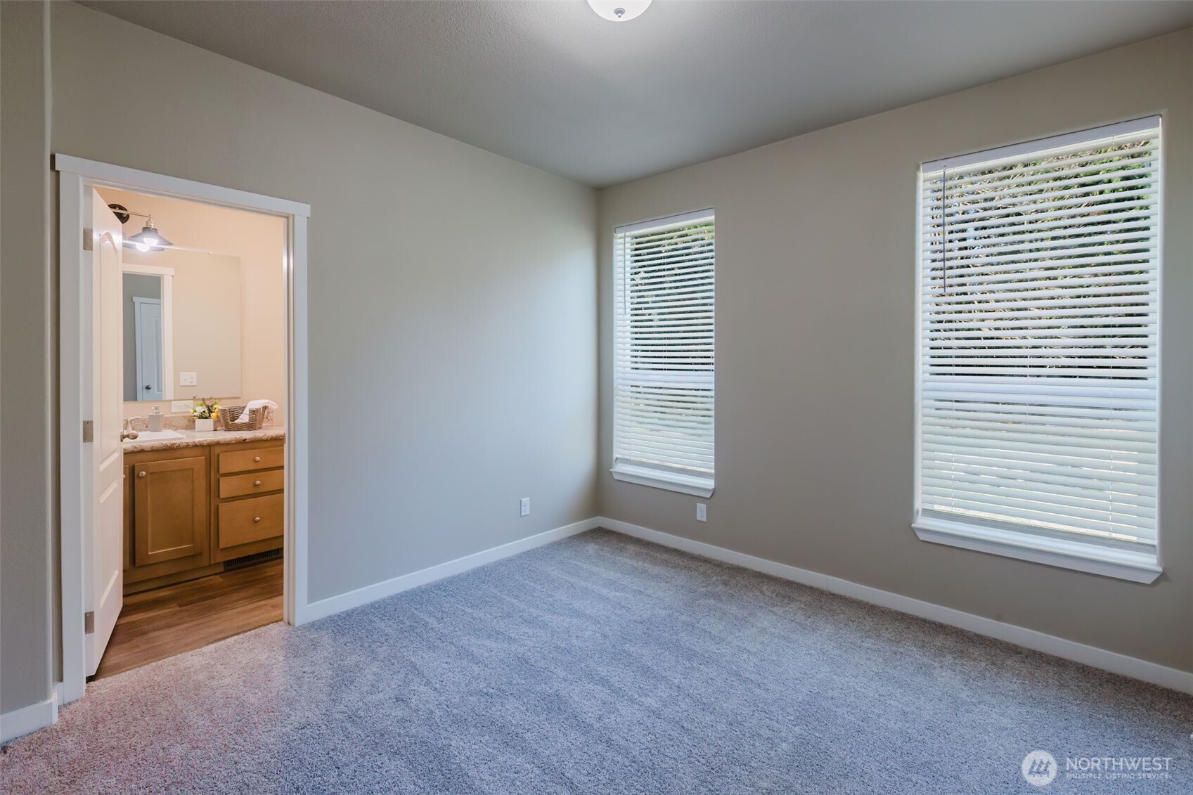 3371 Southeast Bielmeier Road, Unit 95 Port Orchard, WA 98367 - Photo 32 of 40 a view of an empty room with a window