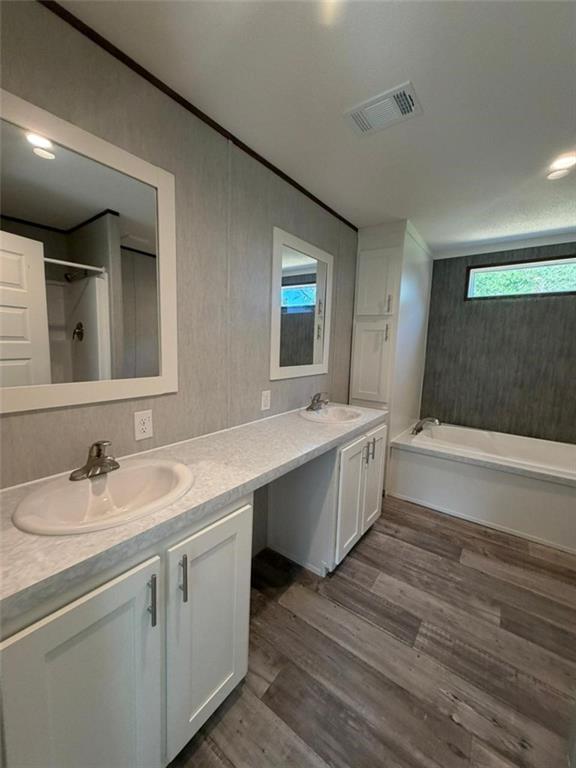 2606 Whipporwill Road Royston, GA 30662 - Photo 11 of 30 a bathroom with a sink and a mirror