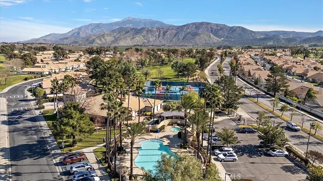 an aerial view of residential house and green space