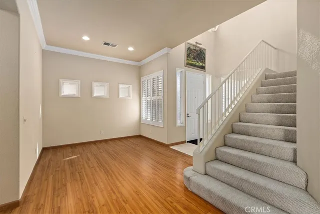 a view of entryway with wooden floor