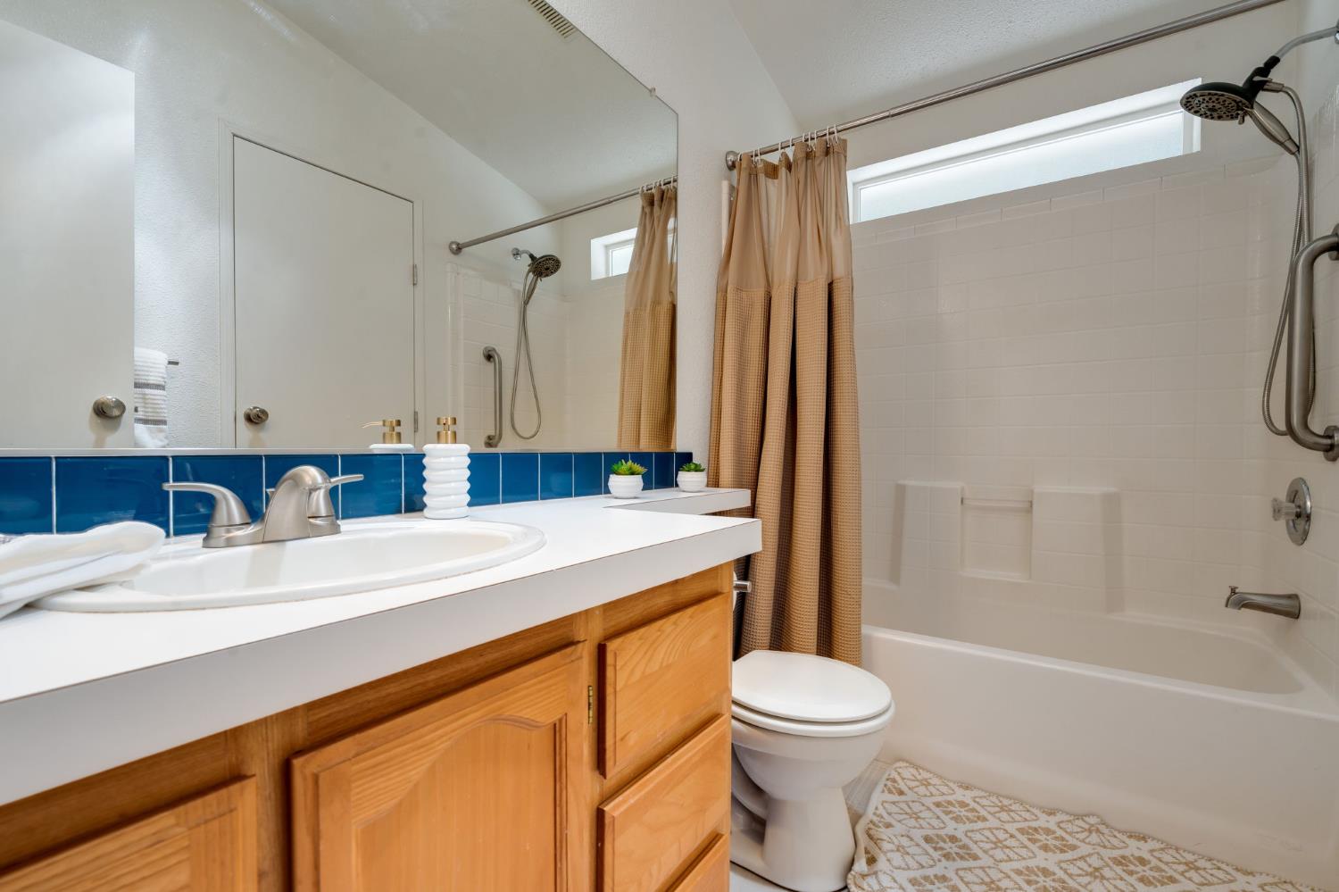28722 Wood Road Pioneer, CA 95666 - Photo 24 of 39 a bathroom with a sink a toilet and shower