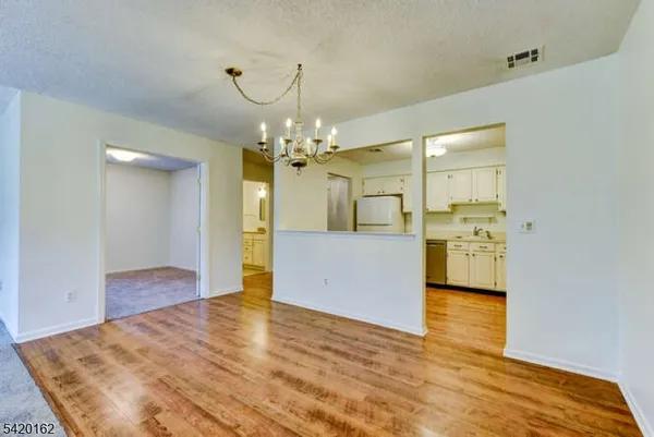 a view of a kitchen with a sink