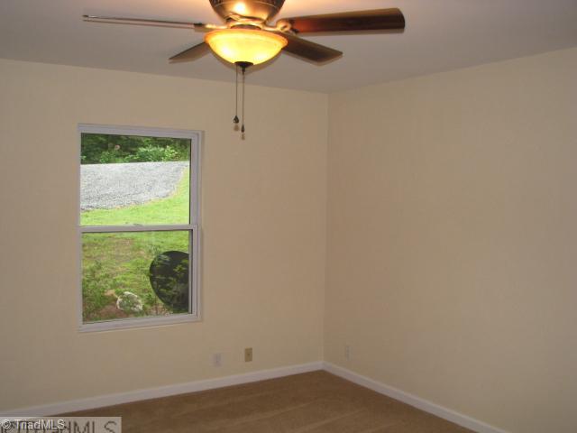 3241 Sheppard Mill Road Sandy Ridge, NC 27046 - Photo 11 of 16 Other. Main/largest bedroom on main floor. Has his and her closets.