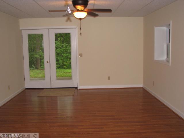 3241 Sheppard Mill Road Sandy Ridge, NC 27046 - Photo 13 of 16 Master Bedroom. Huge master in finished lower level.. Has walk out access to the patio and a beautifull wooded setting.