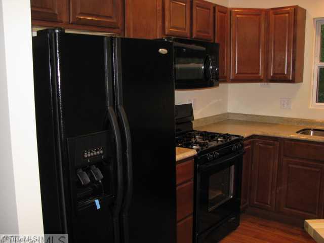 3241 Sheppard Mill Road Sandy Ridge, NC 27046 - Photo 6 of 16 Kitchen. Everything is furnished, ready for you to move right in.