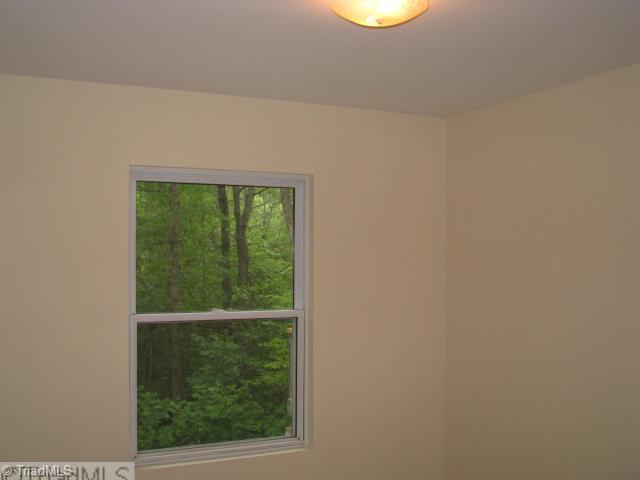 3241 Sheppard Mill Road Sandy Ridge, NC 27046 - Photo 8 of 16 1st Bedroom.
