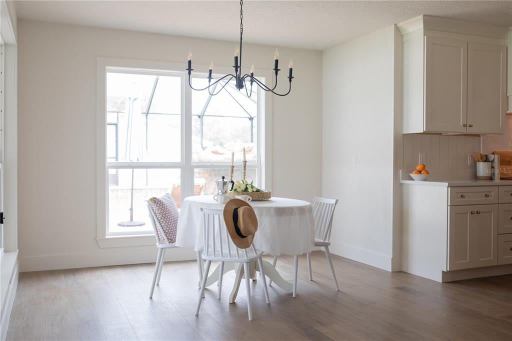 320 Rodeo Road Ormond Beach, FL 32174 - Photo 11 of 53 a view of a dining room with furniture window and outside view