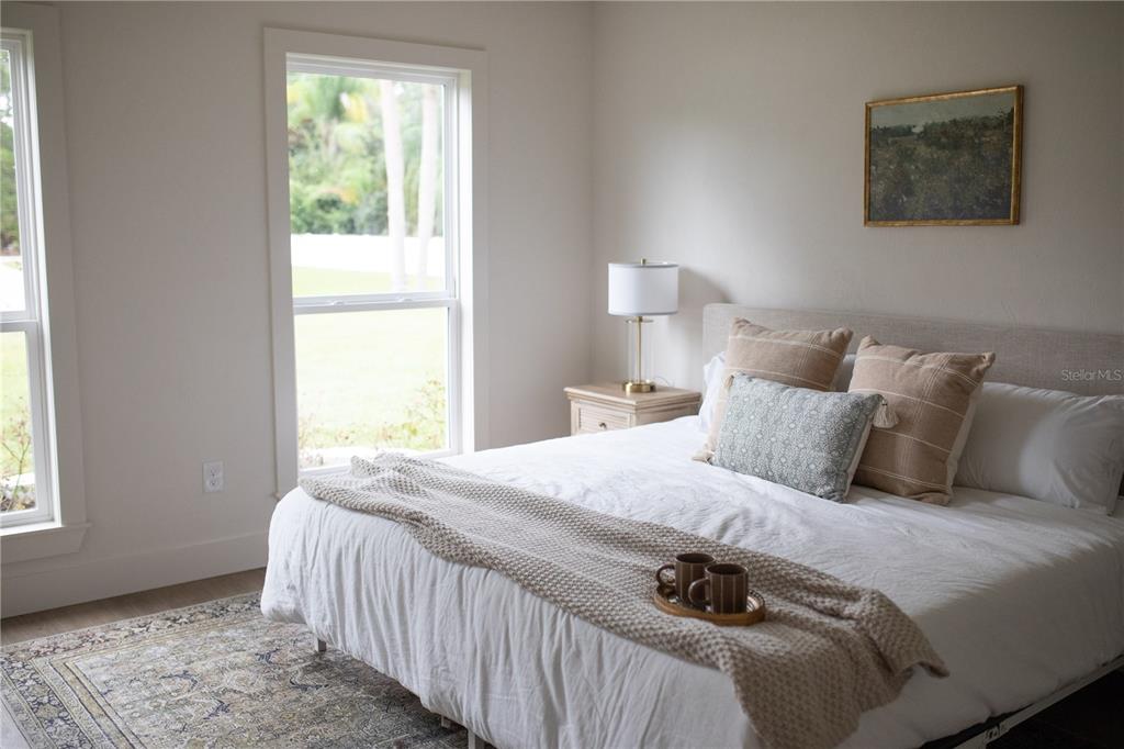 320 Rodeo Road Ormond Beach, FL 32174 - Photo 18 of 53 a bedroom with a bed and a window