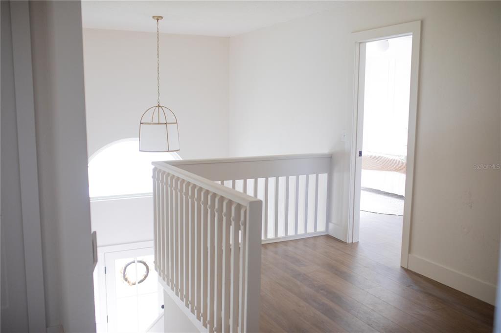 320 Rodeo Road Ormond Beach, FL 32174 - Photo 22 of 53 a view of empty room with wooden floor