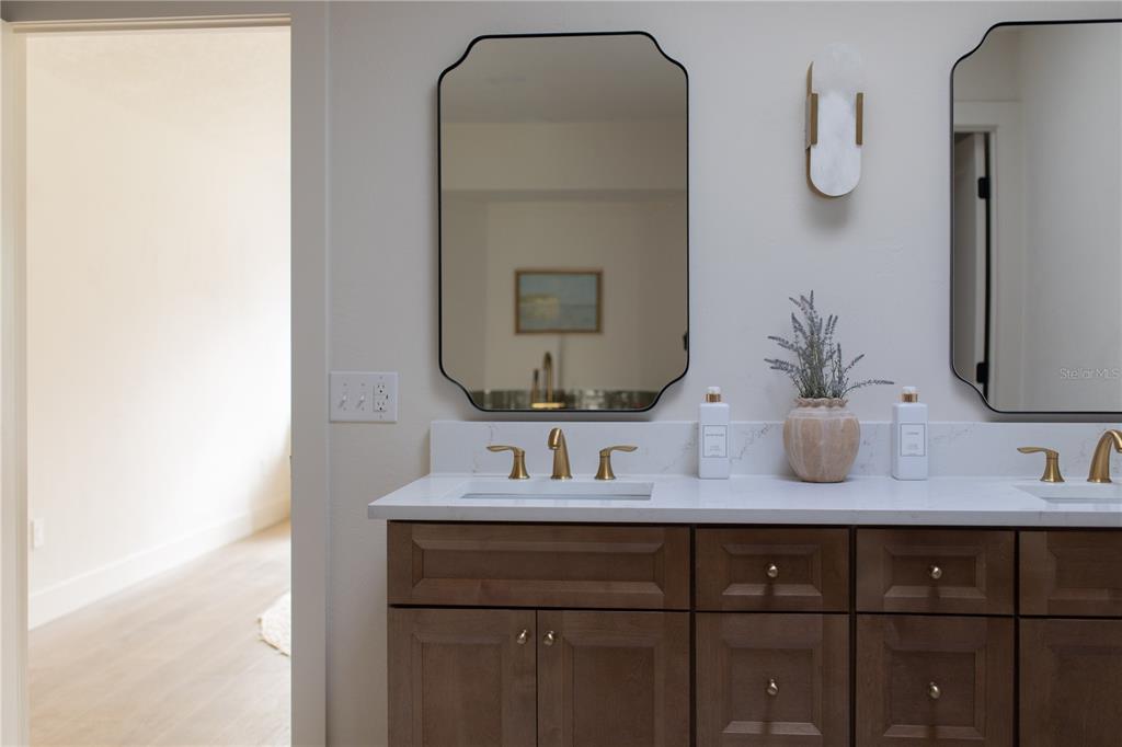 320 Rodeo Road Ormond Beach, FL 32174 - Photo 28 of 53 a bathroom with a sink and a mirror