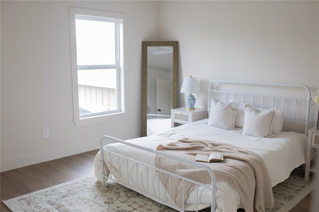 320 Rodeo Road Ormond Beach, FL 32174 - Photo 32 of 53 a bedroom with bed and window