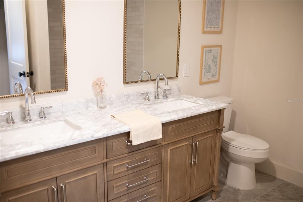 320 Rodeo Road Ormond Beach, FL 32174 - Photo 34 of 53 a bathroom with a sink and a toilet