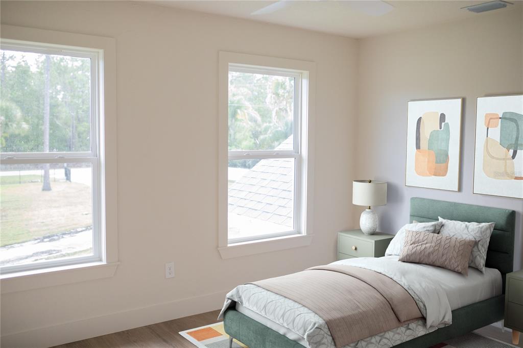 320 Rodeo Road Ormond Beach, FL 32174 - Photo 35 of 53 a bedroom with a bed and a window