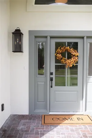 a view of entryway with a front door
