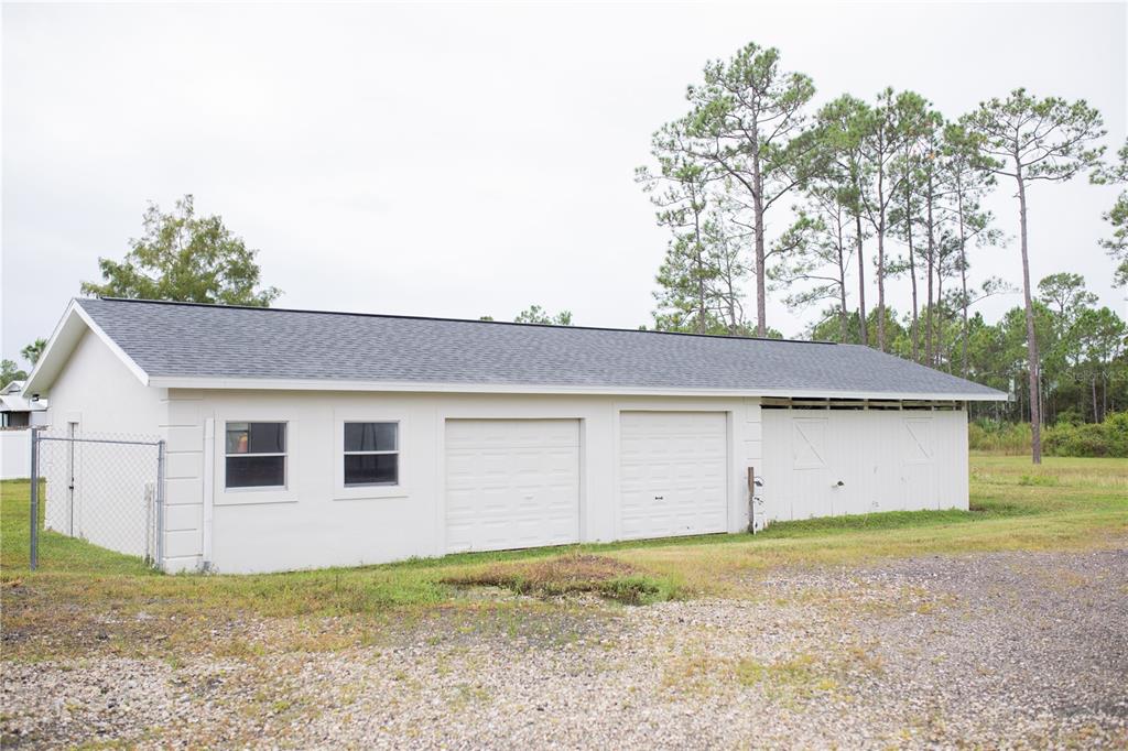 320 Rodeo Road Ormond Beach, FL 32174 - Photo 44 of 53 a view of a house with a backyard
