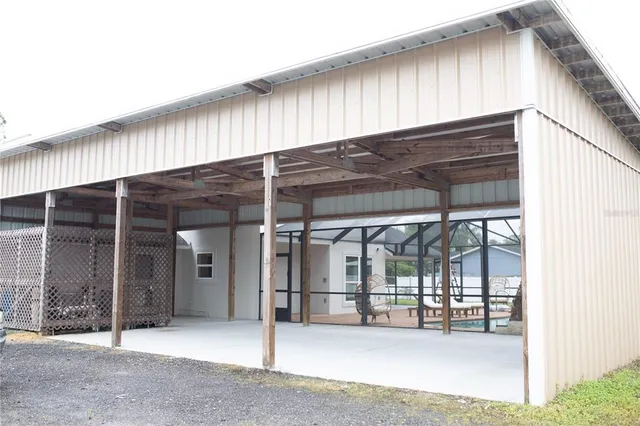 a view of empty room with white walls