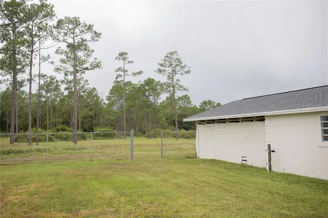 a view of cabinets and chandelier