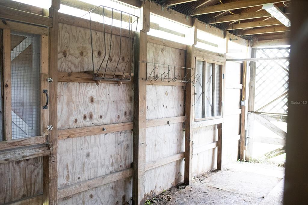 320 Rodeo Road Ormond Beach, FL 32174 - Photo 50 of 53 a view of cabinets and chandelier