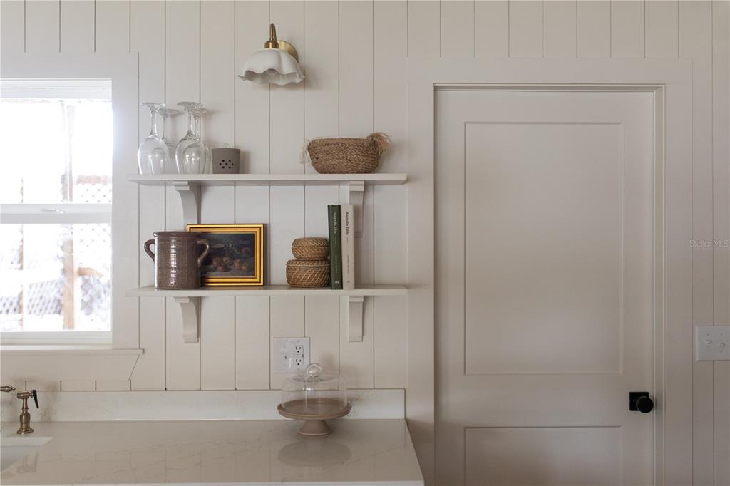 320 Rodeo Road Ormond Beach, FL 32174 - Photo 9 of 53 a bathroom with a sink and a mirror