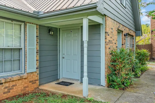 a front view of a house with a garage