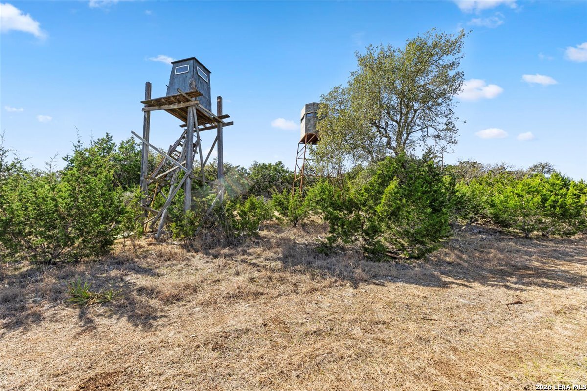 2633 Jackson Creek Road Medina, TX 78055 - Photo 13 of 27 a front view of a house with garden
