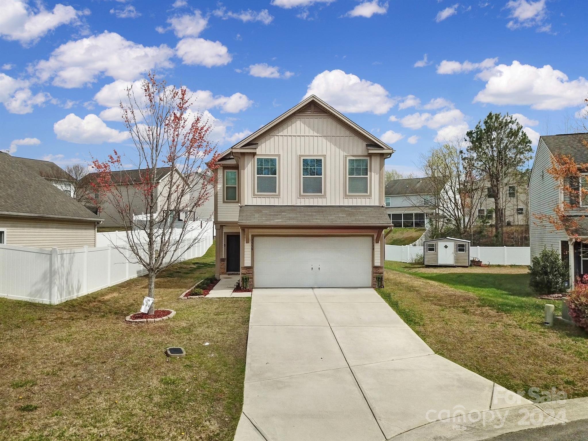 1539 Logan Patrick Court Gastonia, NC 28052 - Photo 1 of 26 a view of a house with a yard