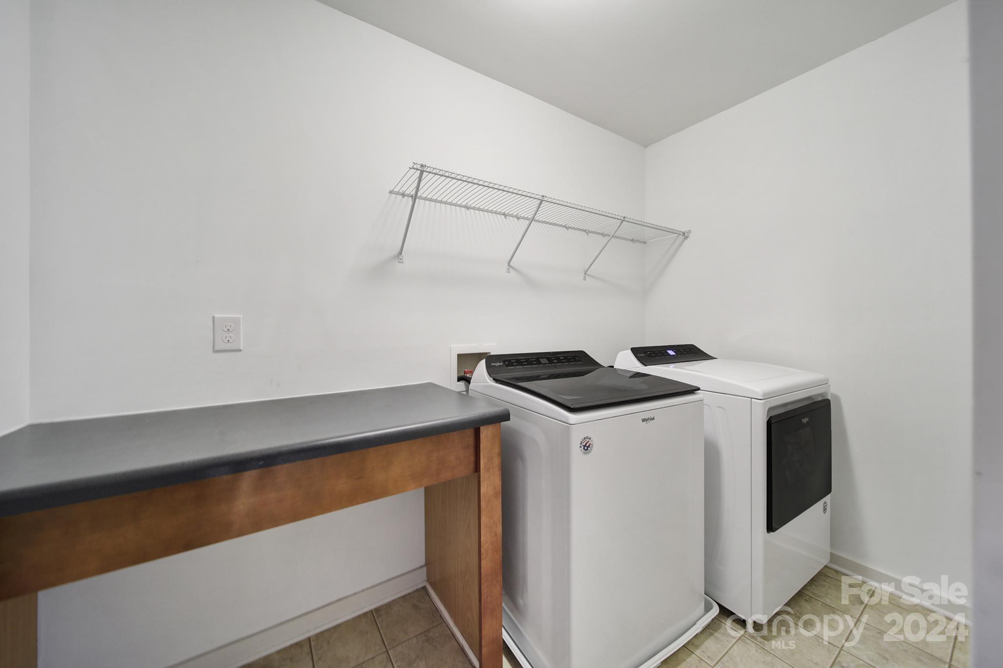 1539 Logan Patrick Court Gastonia, NC 28052 - Photo 14 of 26 a utility room with dryer and washer