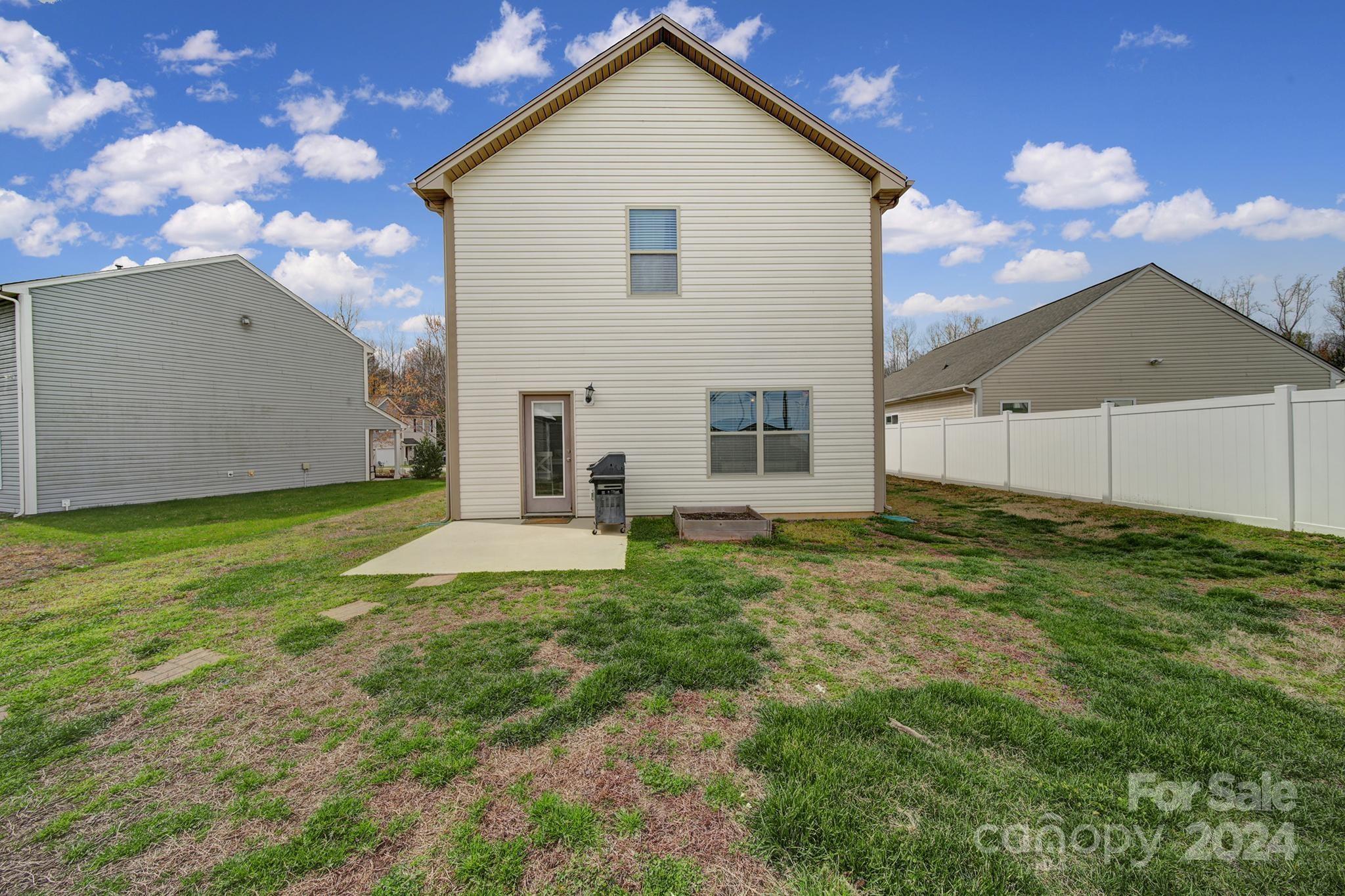 1539 Logan Patrick Court Gastonia, NC 28052 - Photo 21 of 26 a view of an house with backyard and garden