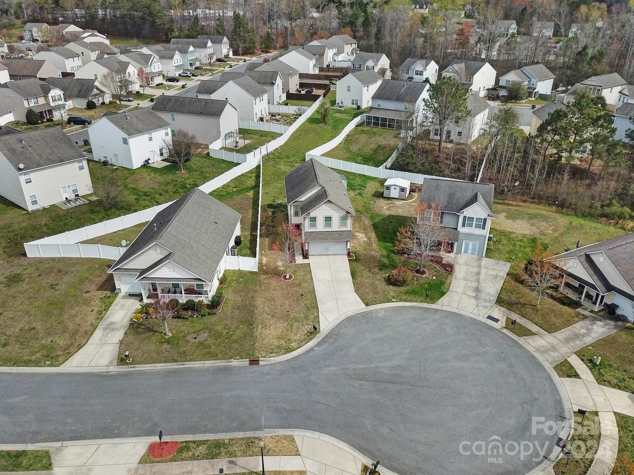 1539 Logan Patrick Court Gastonia, NC 28052 - Photo 24 of 26 an aerial view of a house with a swimming pool