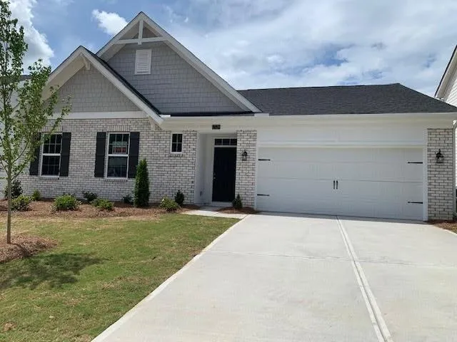 a house with yard in front of it