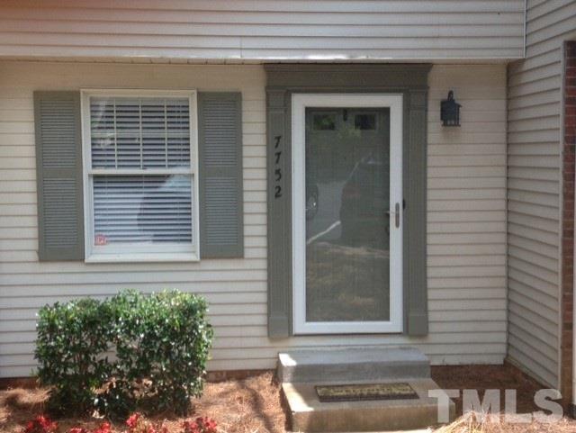 7752 Sandra Lane Raleigh, NC 27615 - Photo 1 of 6 a front view of a house with a window