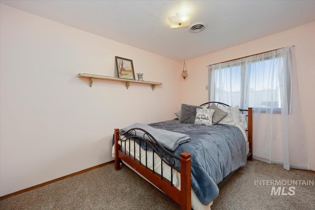 956 Bitterroot Place Twin Falls, ID 83301 - Photo 23 of 48 Plush carpet flooring complements soft wall tones