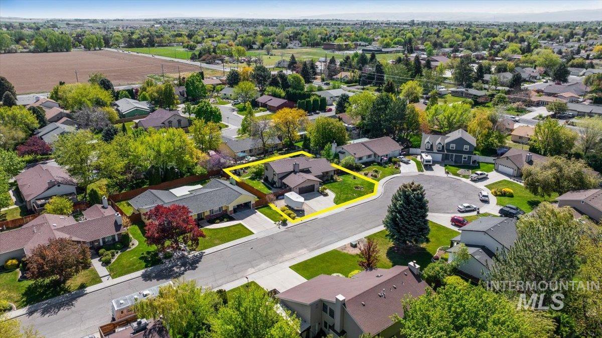 956 Bitterroot Place Twin Falls, ID 83301 - Photo 37 of 48 Aerial view of a residential neighborhood featuring established homes and mature landscaping