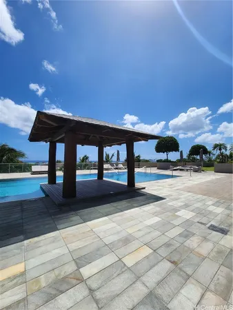 a view of backyard with a patio