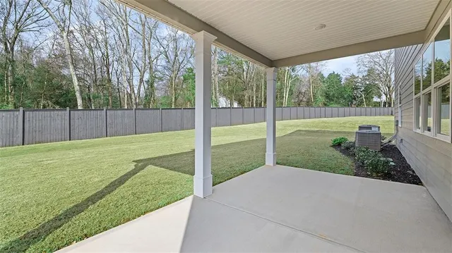a view of a porch with a backyard