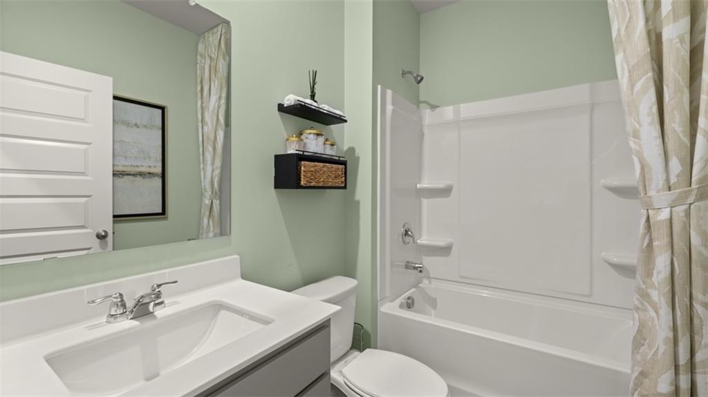 398 Bullock Pass Jefferson, GA 30549 - Photo 18 of 44 a bathroom with a sink toilet and shower