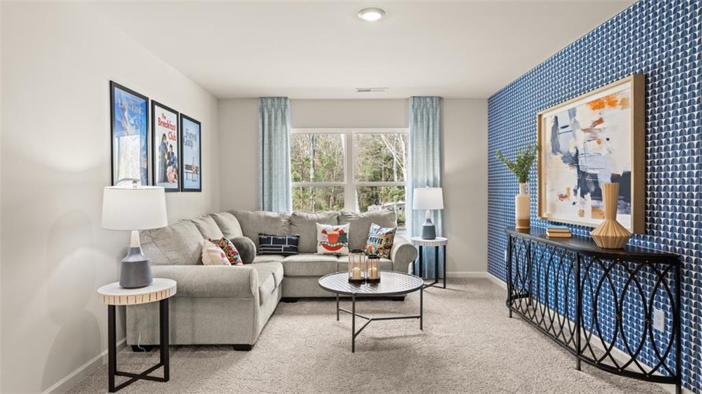 398 Bullock Pass Jefferson, GA 30549 - Photo 19 of 44 a living room with furniture and a large window