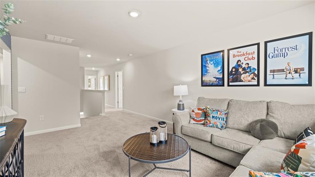 398 Bullock Pass Jefferson, GA 30549 - Photo 21 of 44 a living room with furniture and a rug