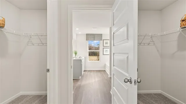 a bathroom with a sink a mirror and a shower