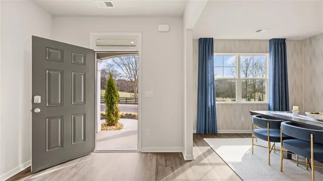 a view of a livingroom with furniture