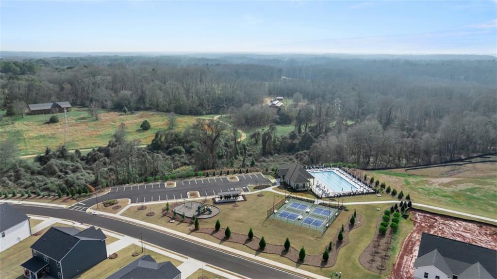 398 Bullock Pass Jefferson, GA 30549 - Photo 33 of 44 a view of a balcony with two chairs and a yard