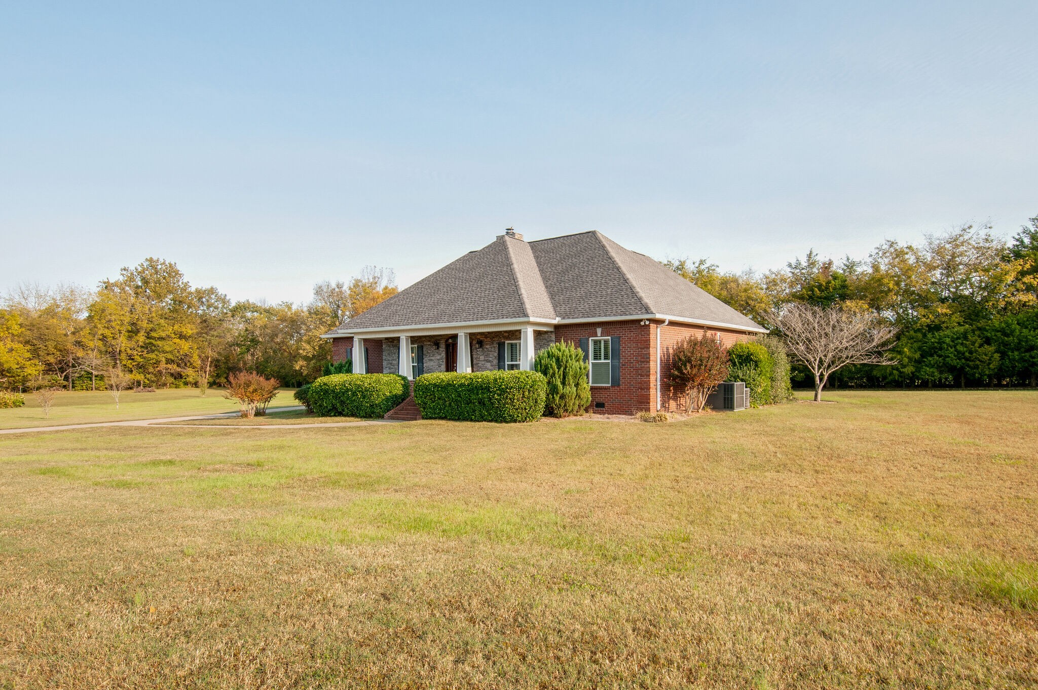 200 Ridgewater Way Mount Juliet, TN 37122 - Photo 2 of 37 a front view of a house with a garden and trees